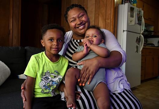 Person with 2 children